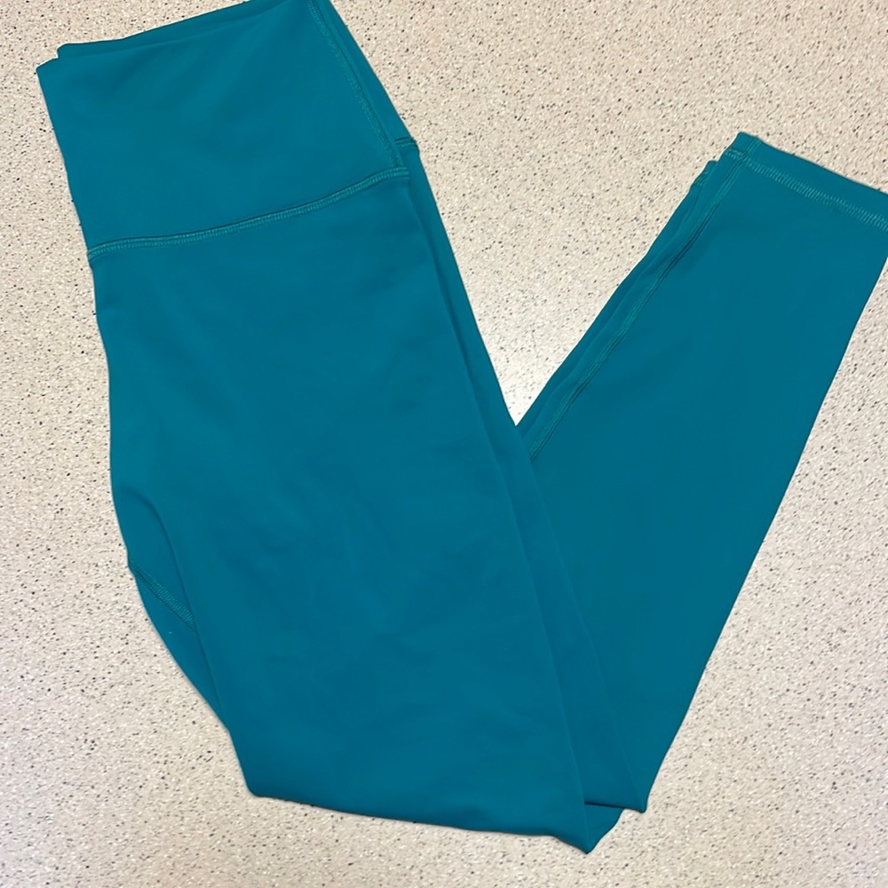 FLEO silky leggings size Large